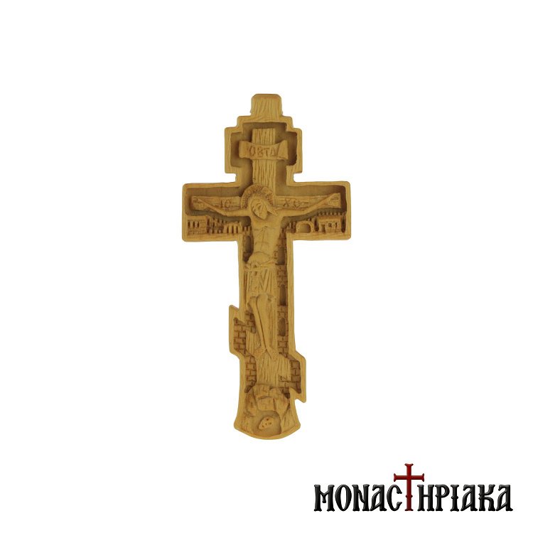 Wood carved pectoral cross with a footstool